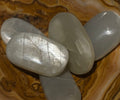 Green moonstone pocket stone