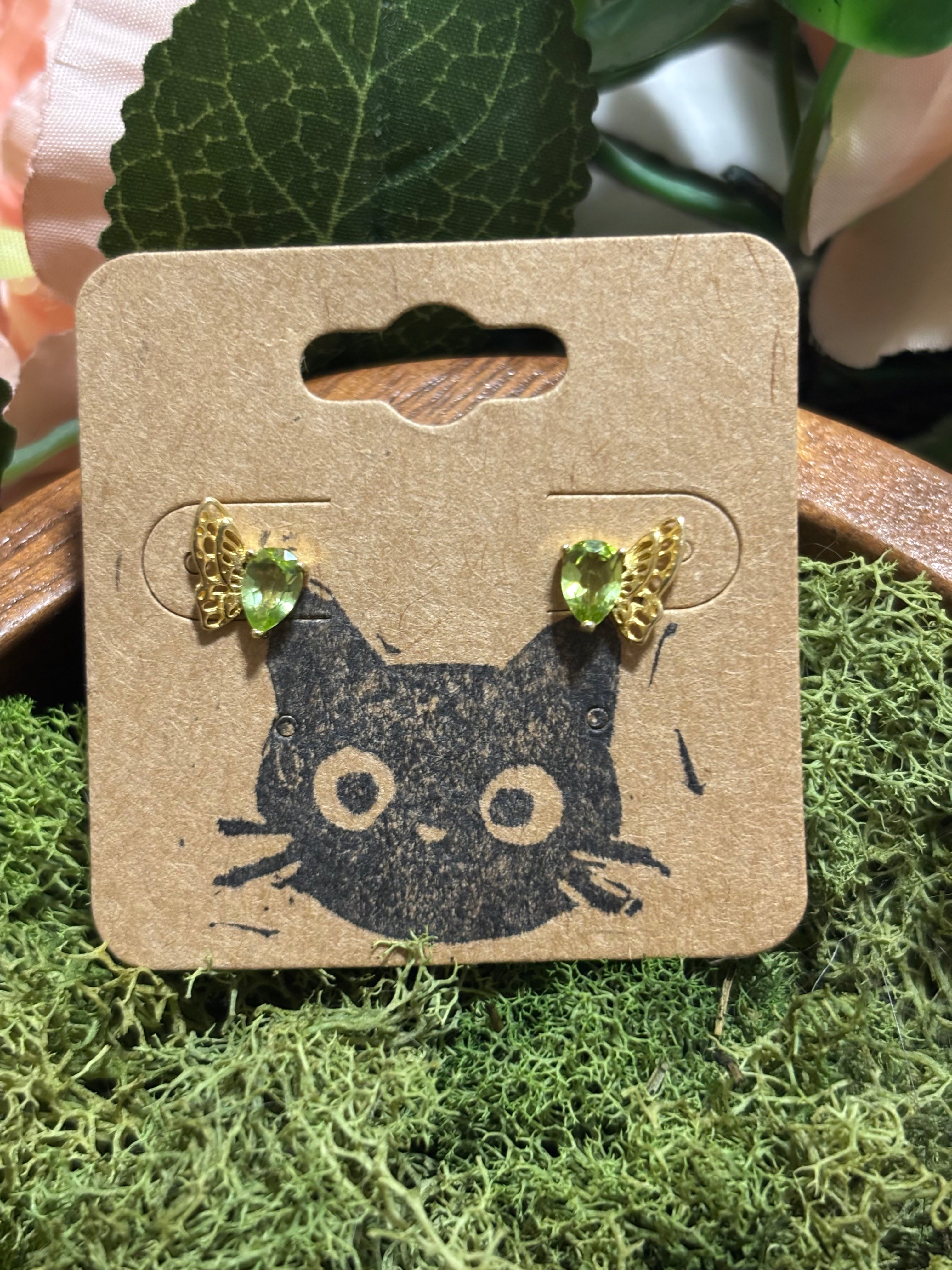 Peridot butterfly stud earrings
