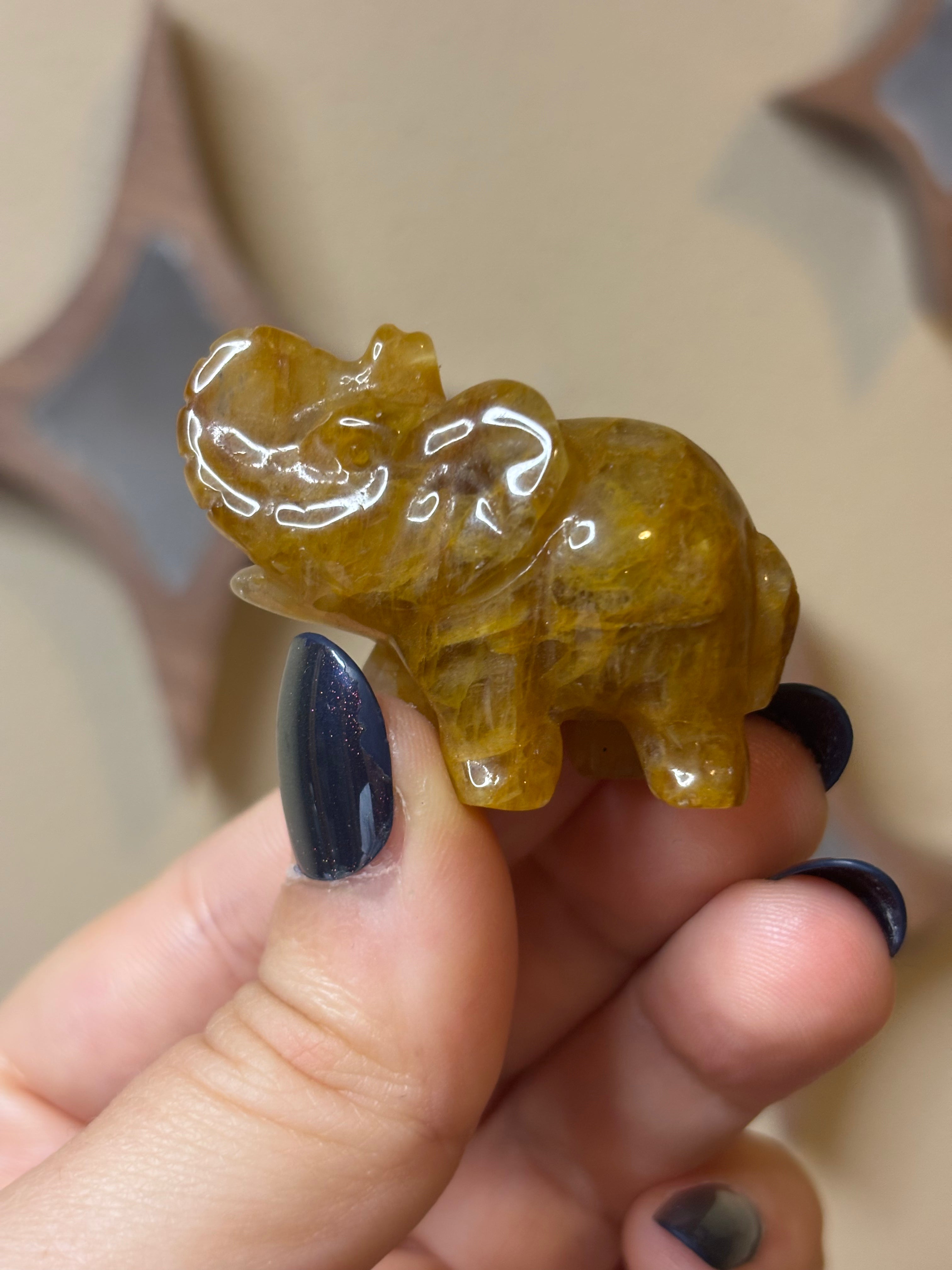Golden healer elephant carving