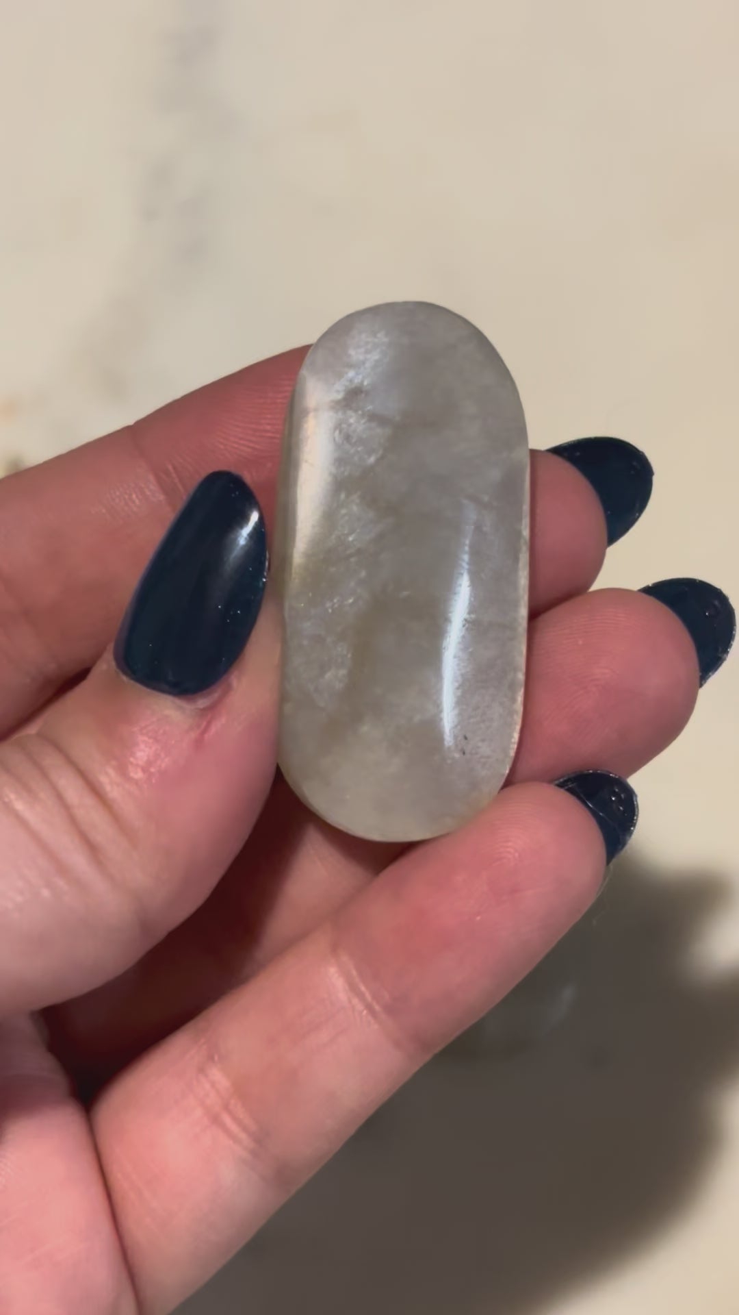 Green moonstone pocket stone